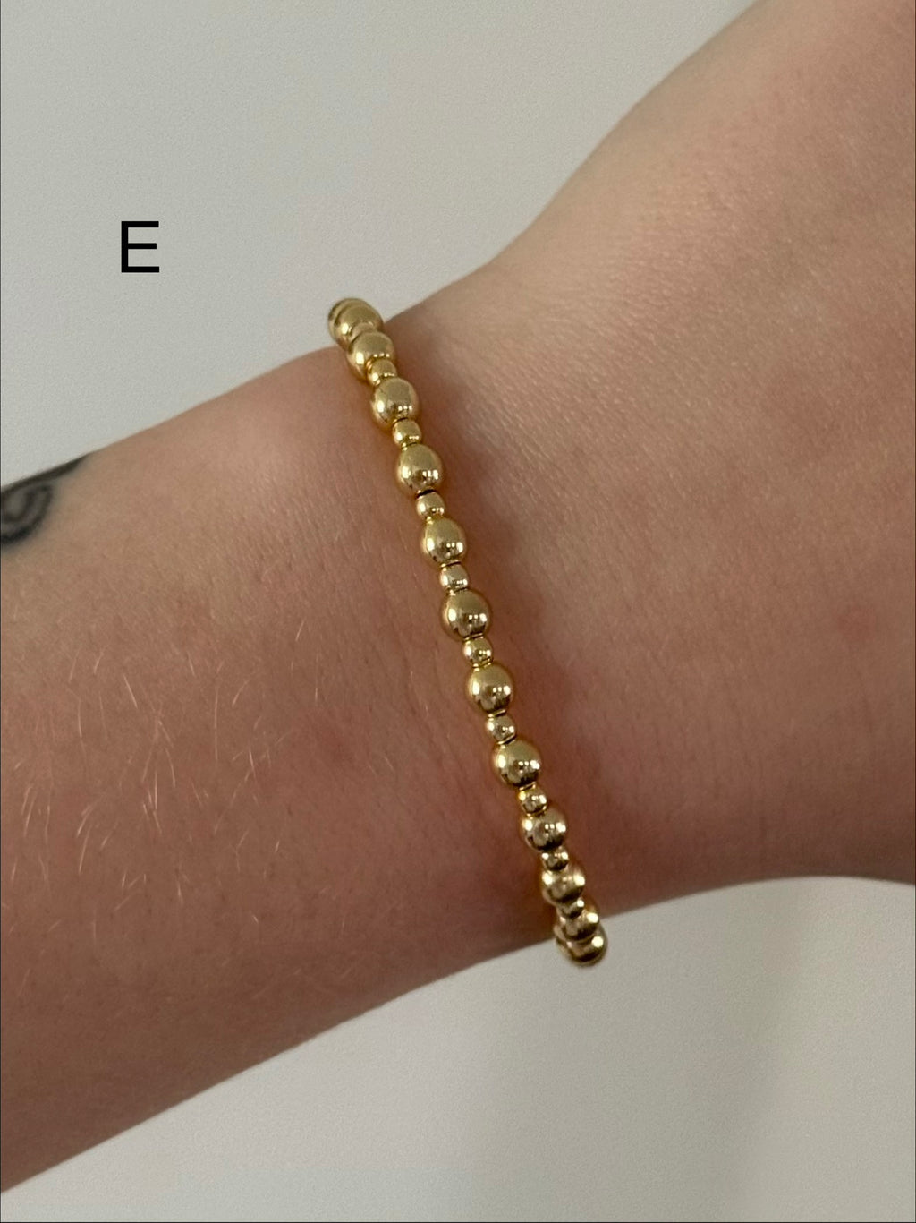 Classic bracelet stack in gold