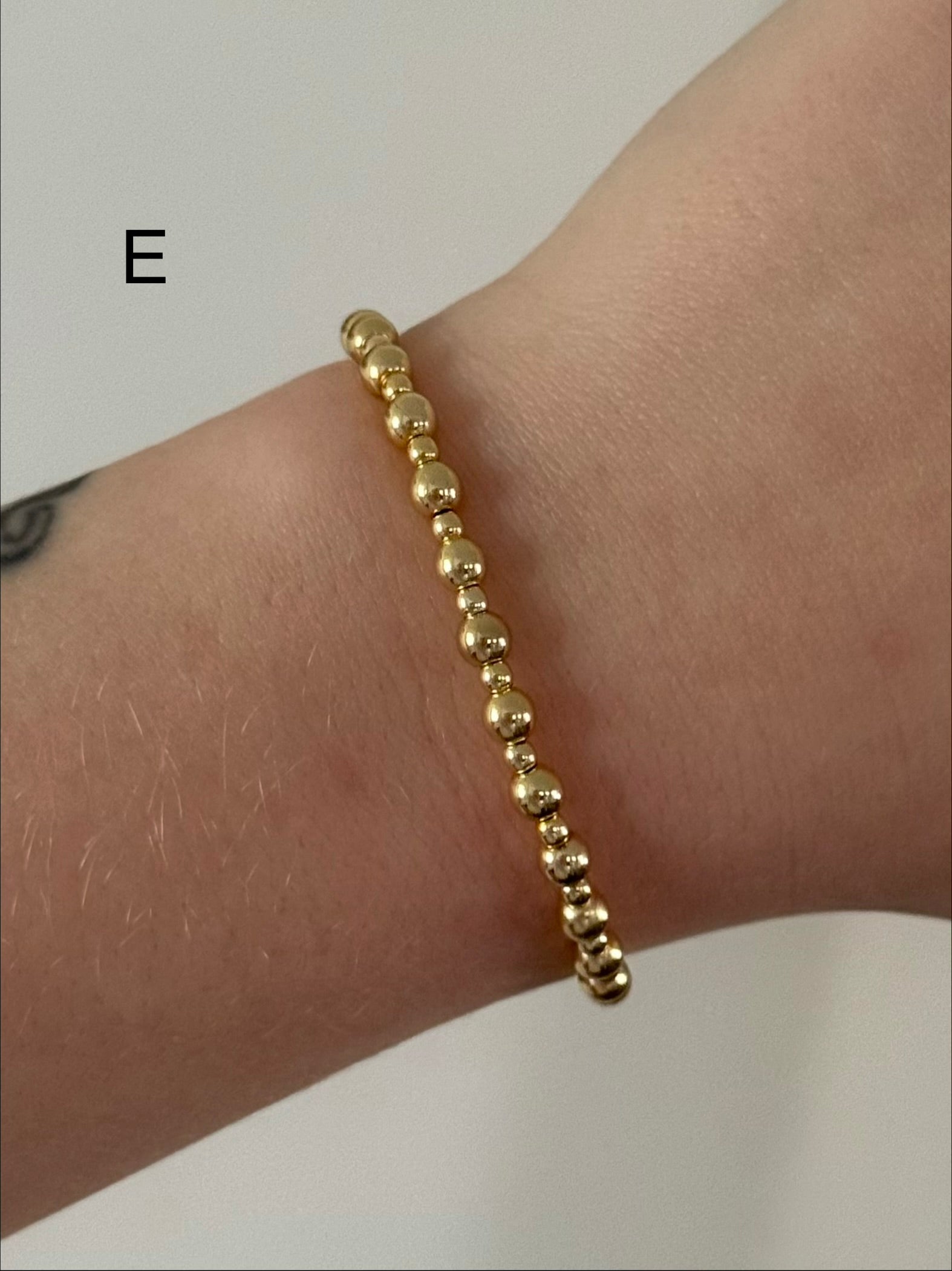 Classic bracelet stack in gold
