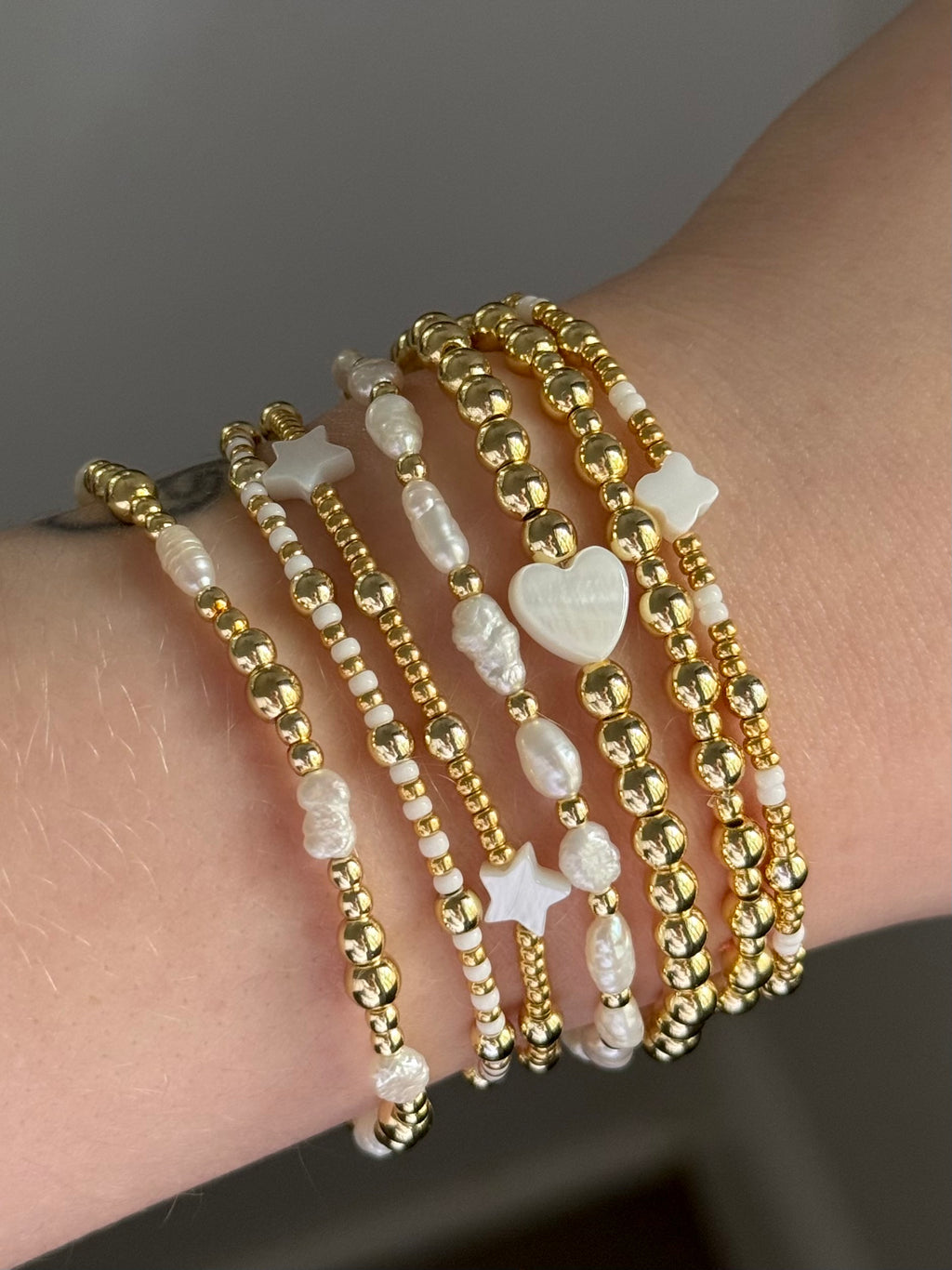Classic bracelet stack in gold