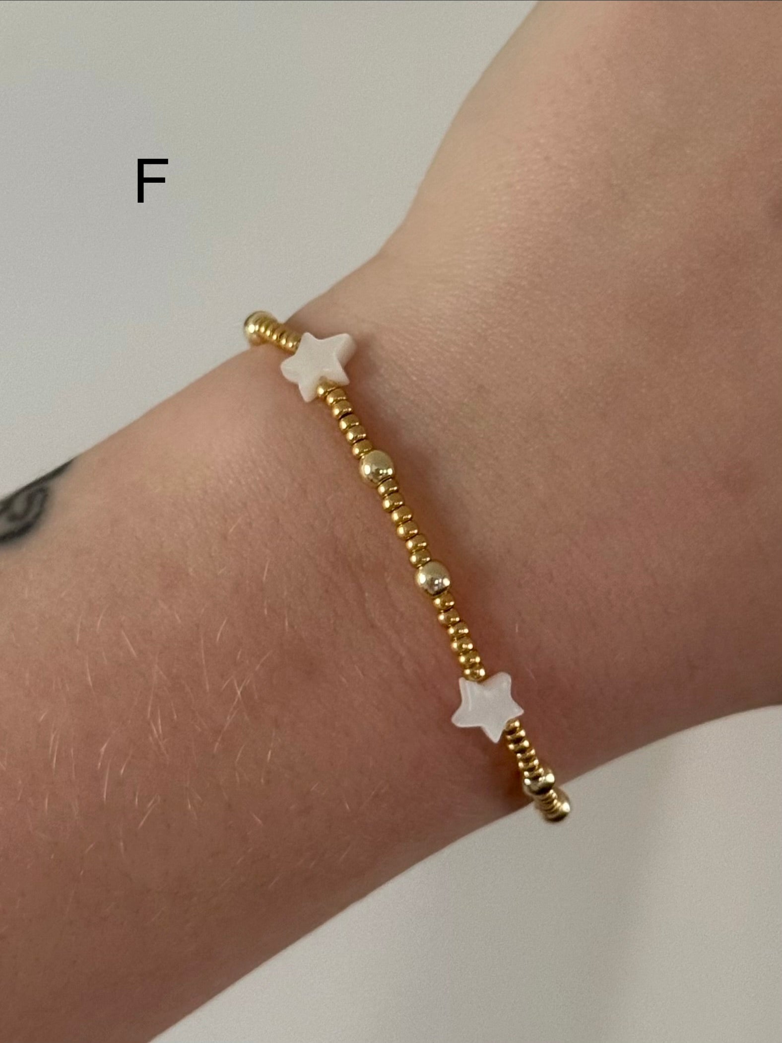Classic bracelet stack in gold