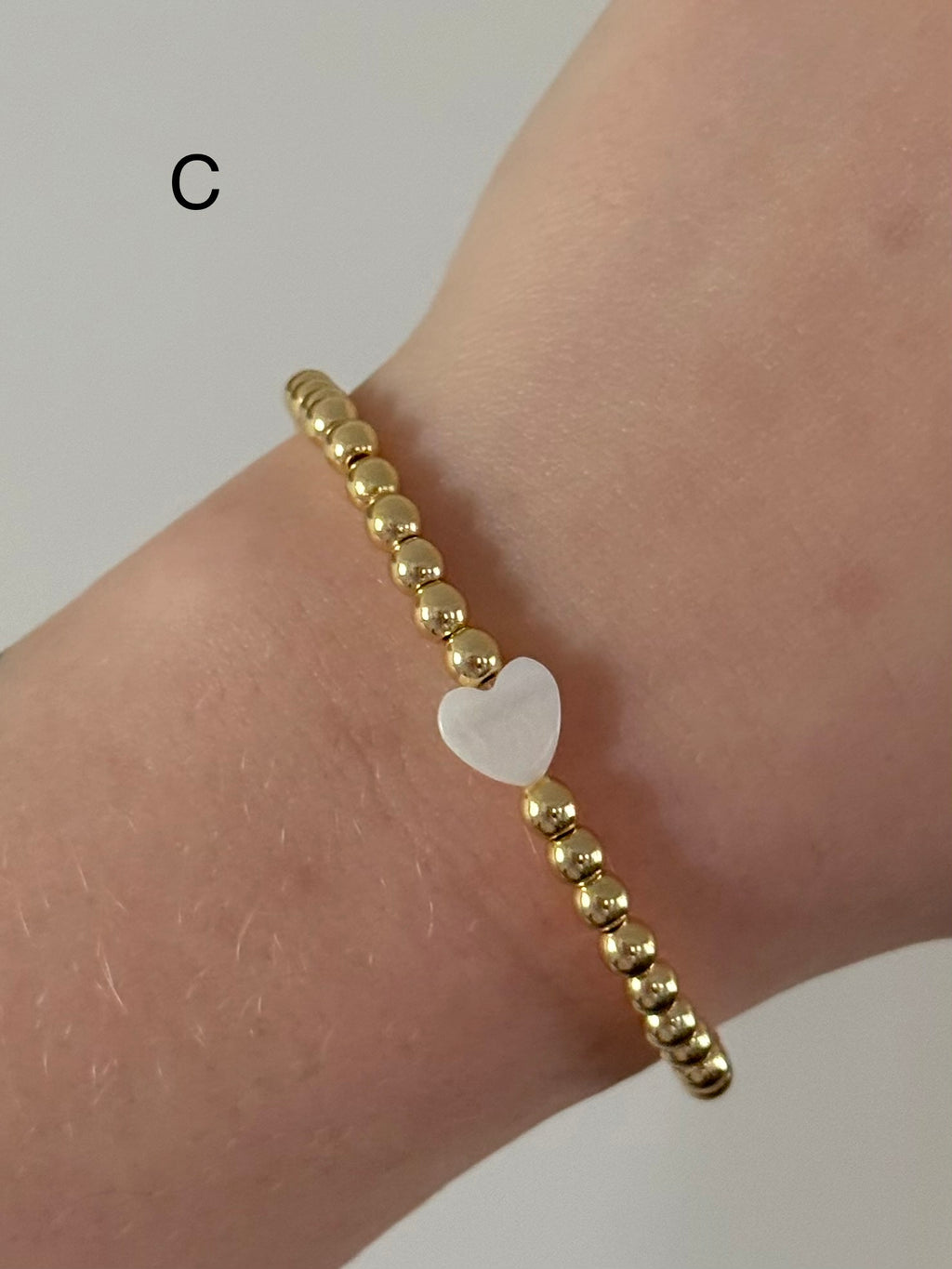 Classic bracelet stack in gold