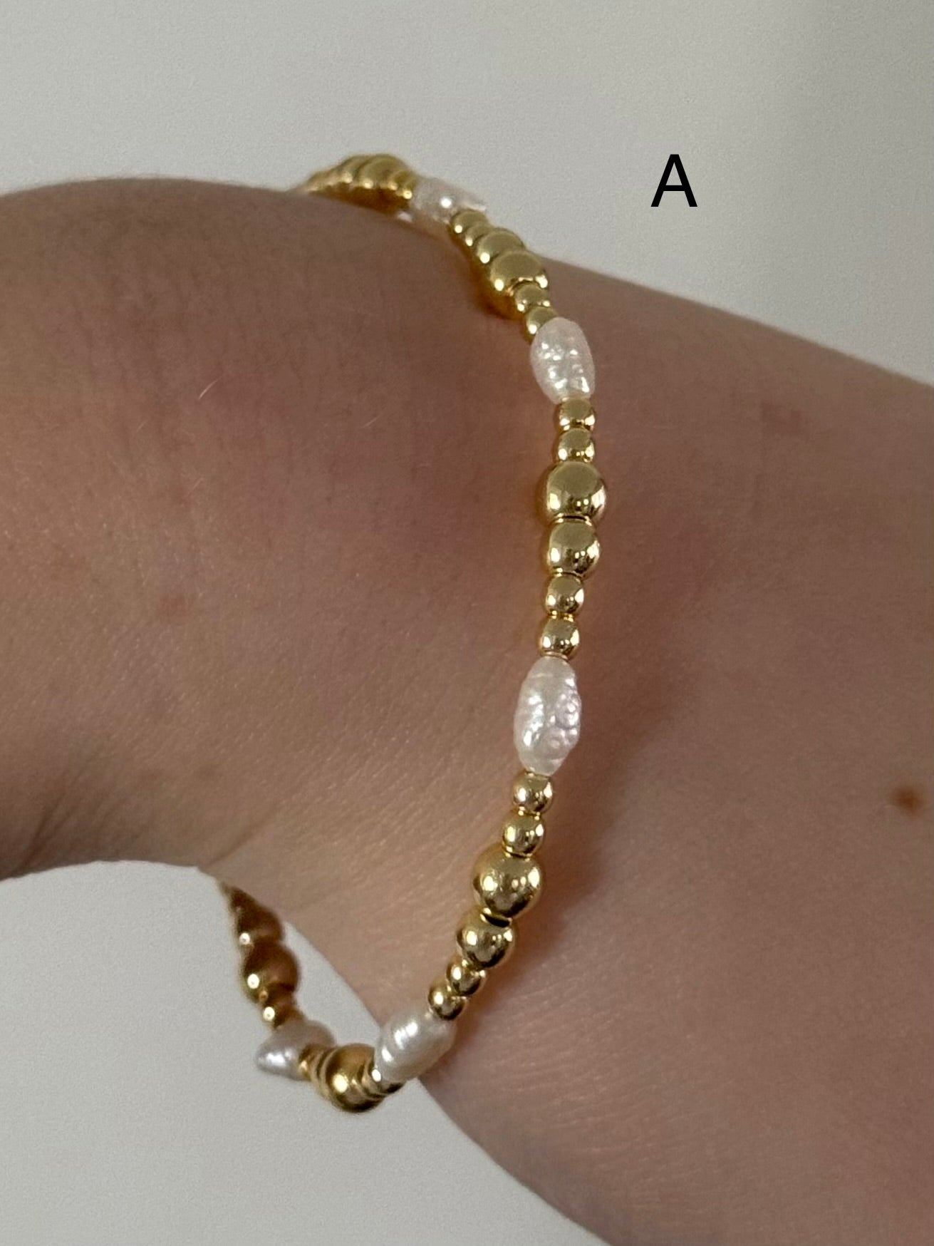 Classic bracelet stack in gold